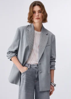 Blazer gessato con borchie