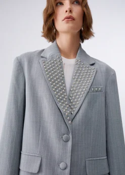 Blazer gessato con borchie