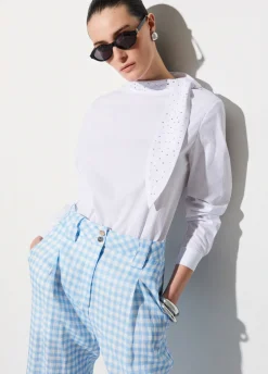 Blusa con maxi fiocco