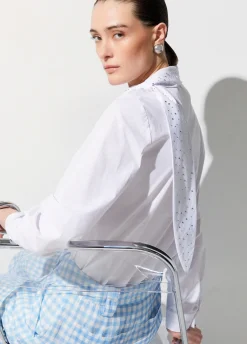 Blusa con maxi fiocco