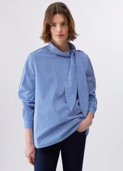 Blusa con maxi fiocco