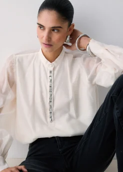 Blusa con ricami gioiello