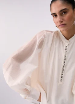 Blusa con ricami gioiello