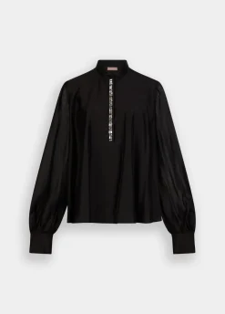 Blusa con ricami gioiello