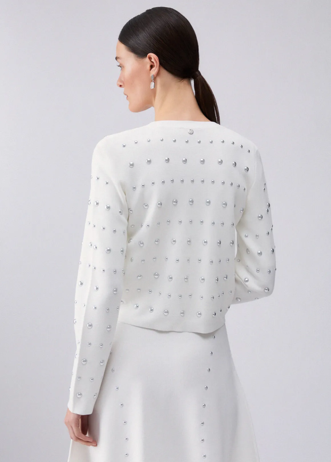 Cardigan con borchie
