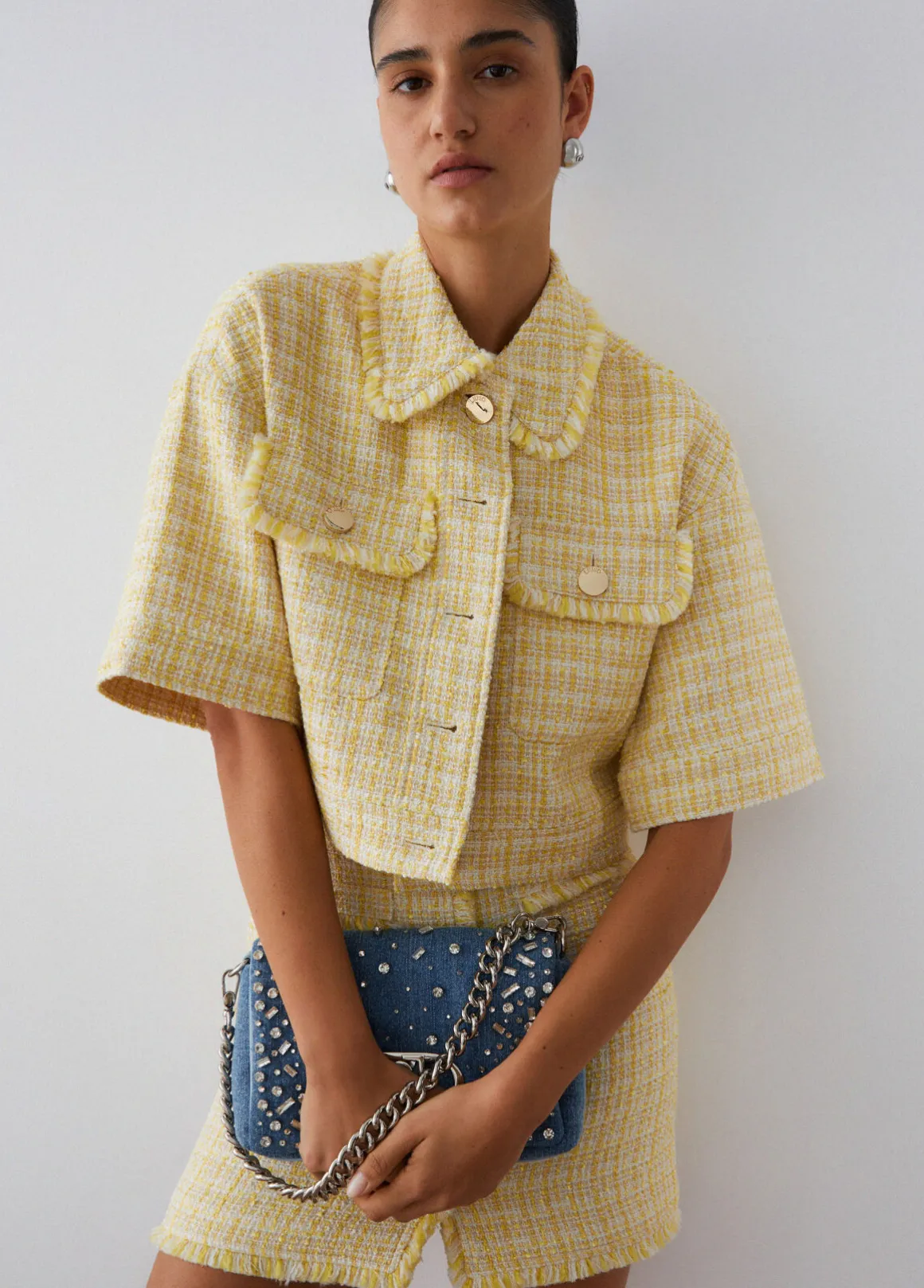 Giacca cropped in bouclé