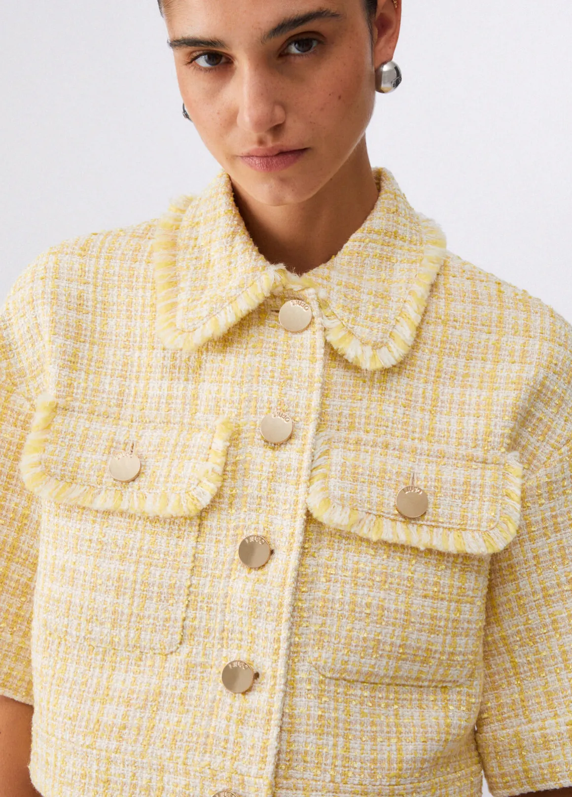 Giacca cropped in bouclé