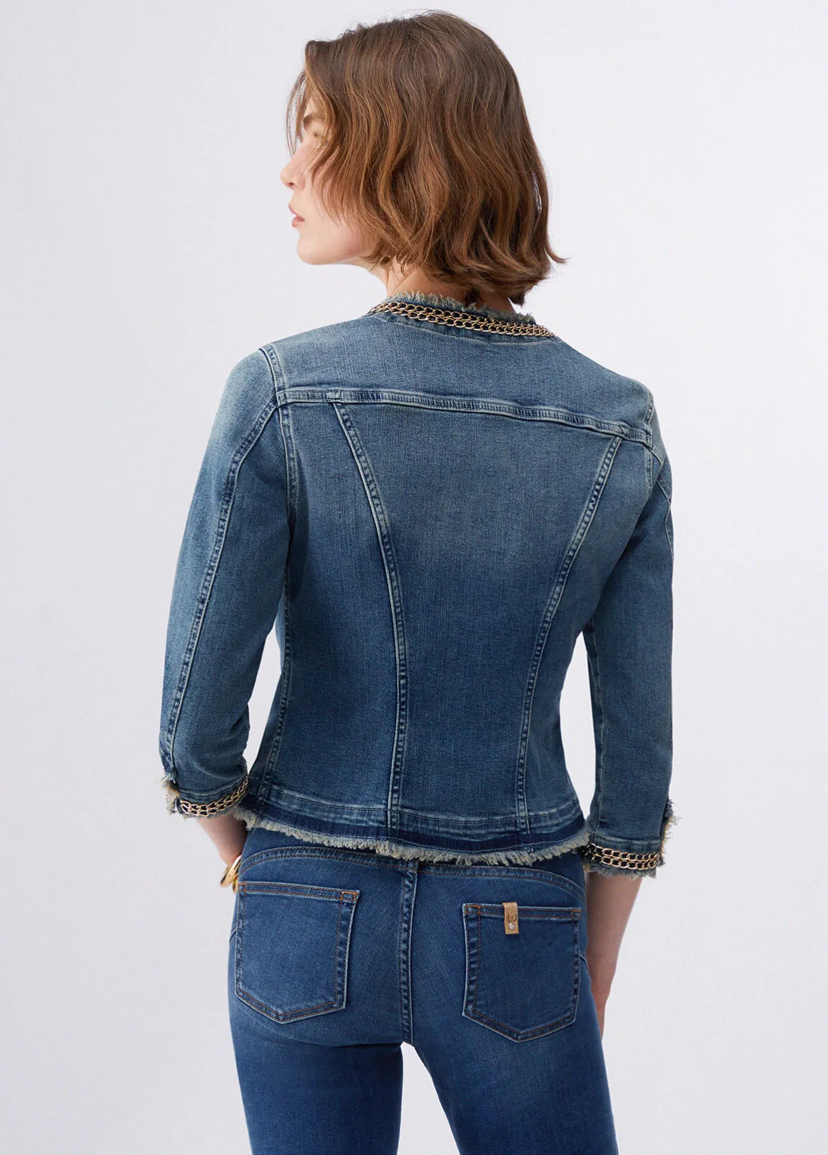 Giacca in denim con catene gioiello