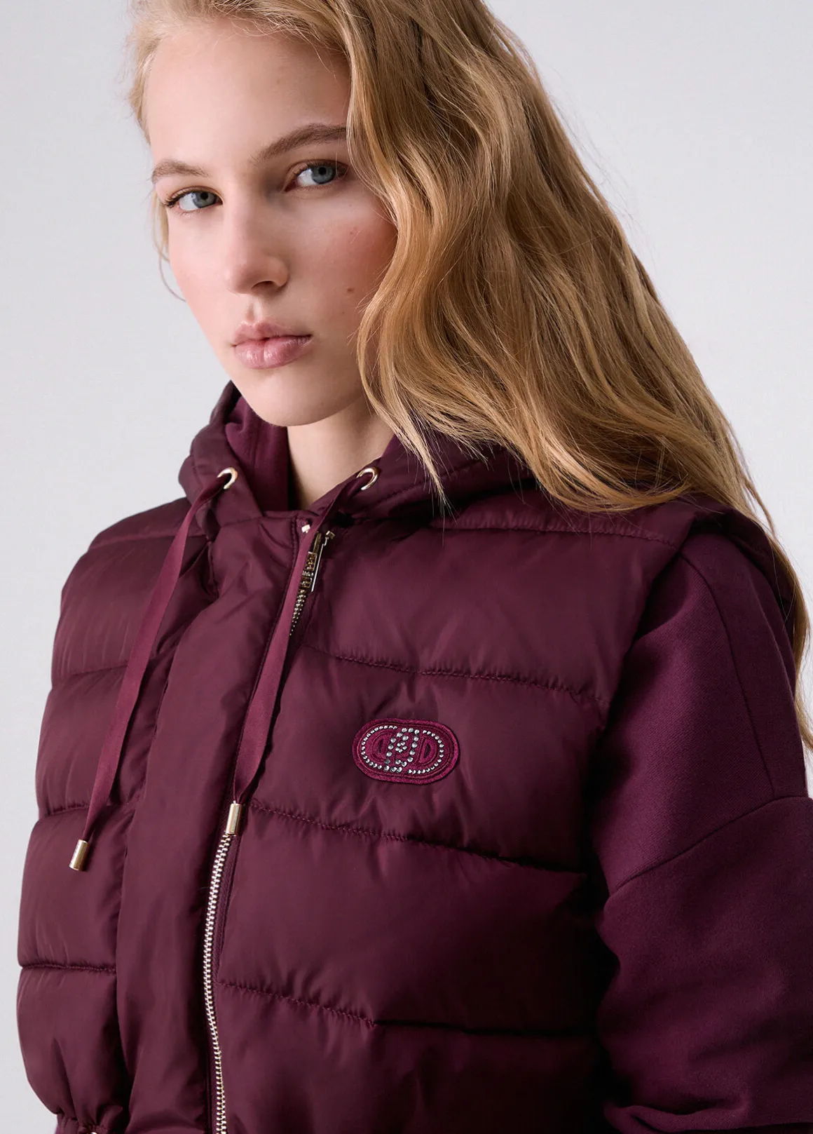 Gilet con cappuccio