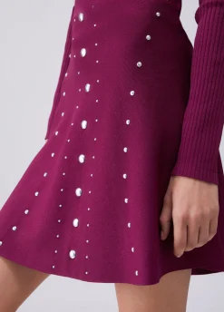 Gonna in maglia con borchie