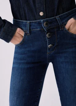 Jeans bootcut con bottoni gioiello