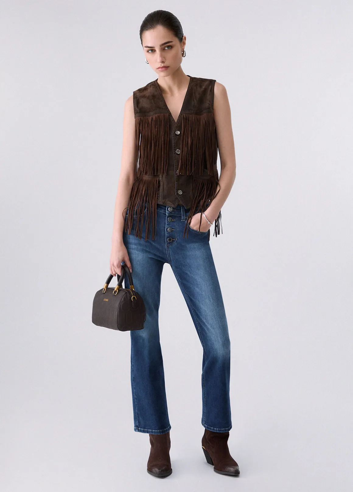 Jeans bootcut con bottoni gioiello