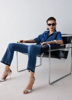 Jeans bootcut con orli unfinished
