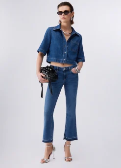 Jeans bootcut con orli unfinished