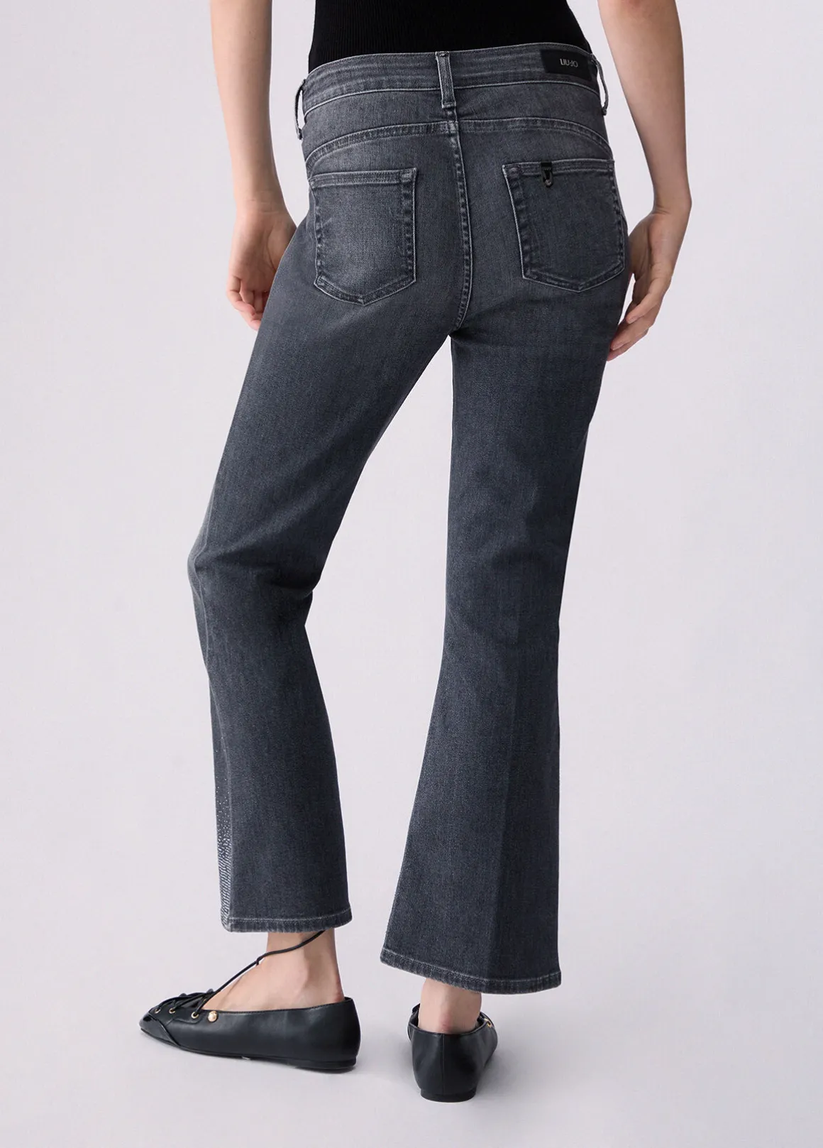 Jeans bootcut con strass