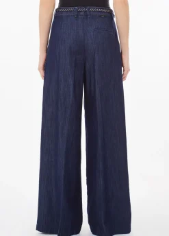 Jeans flare con pinces