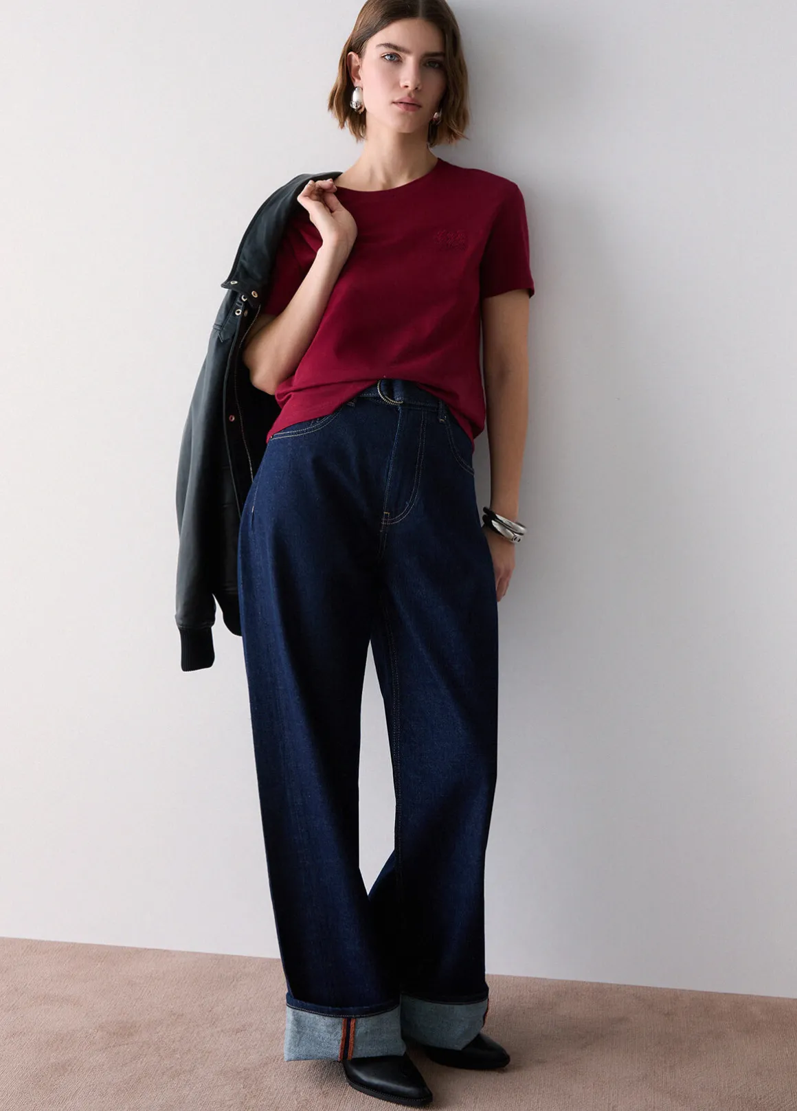 Jeans flare con risvolto