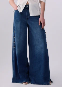 Jeans flare con spacchetti