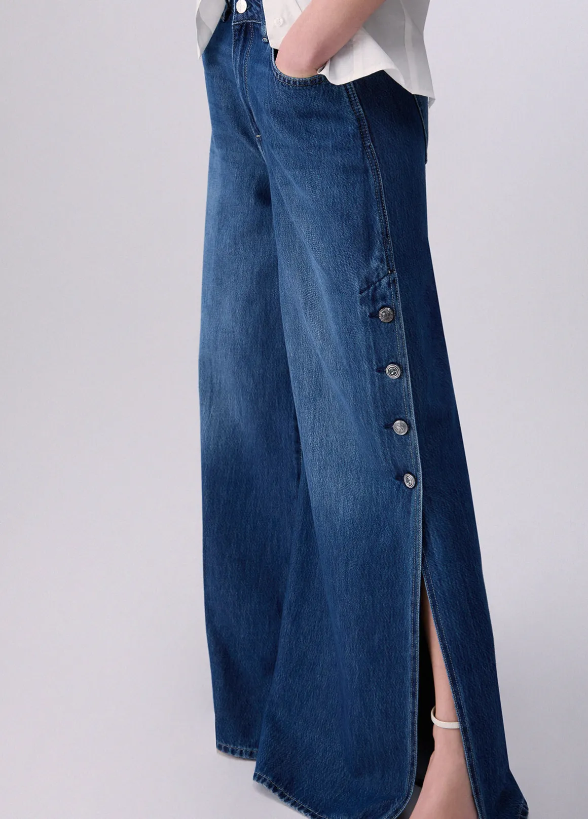 Jeans flare con spacchetti