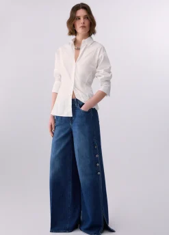 Jeans flare con spacchetti