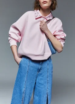 Jeans flare con spacchetti