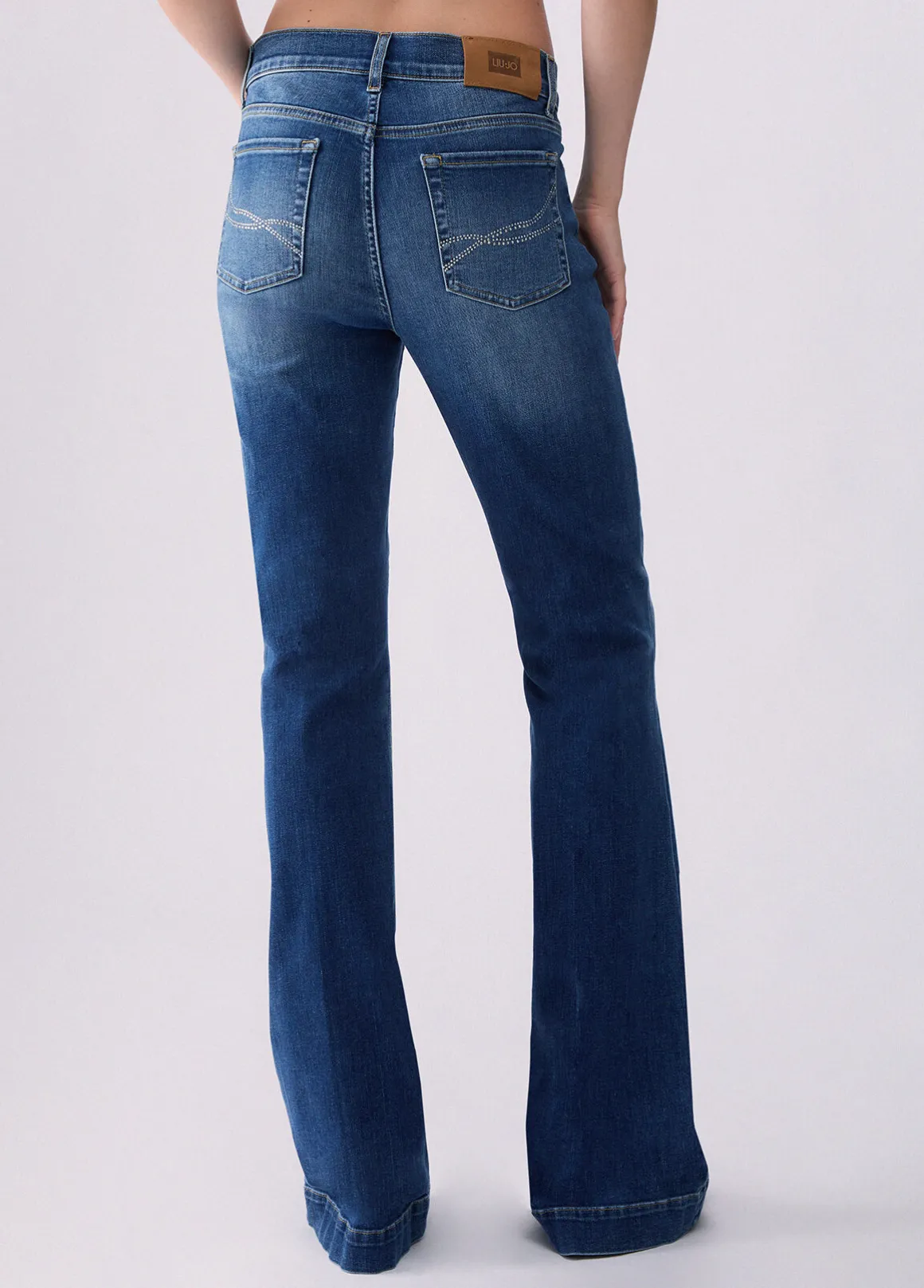Jeans flare con strass