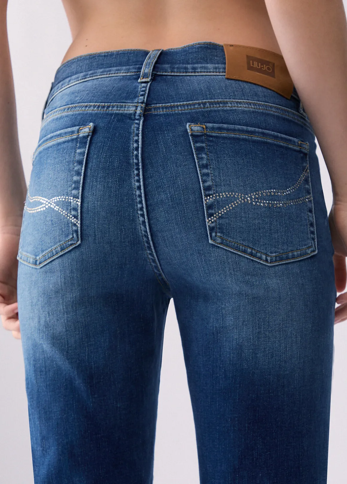 Jeans flare con strass