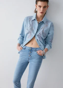 Jeans skinny con risvolto