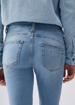 Jeans skinny con risvolto