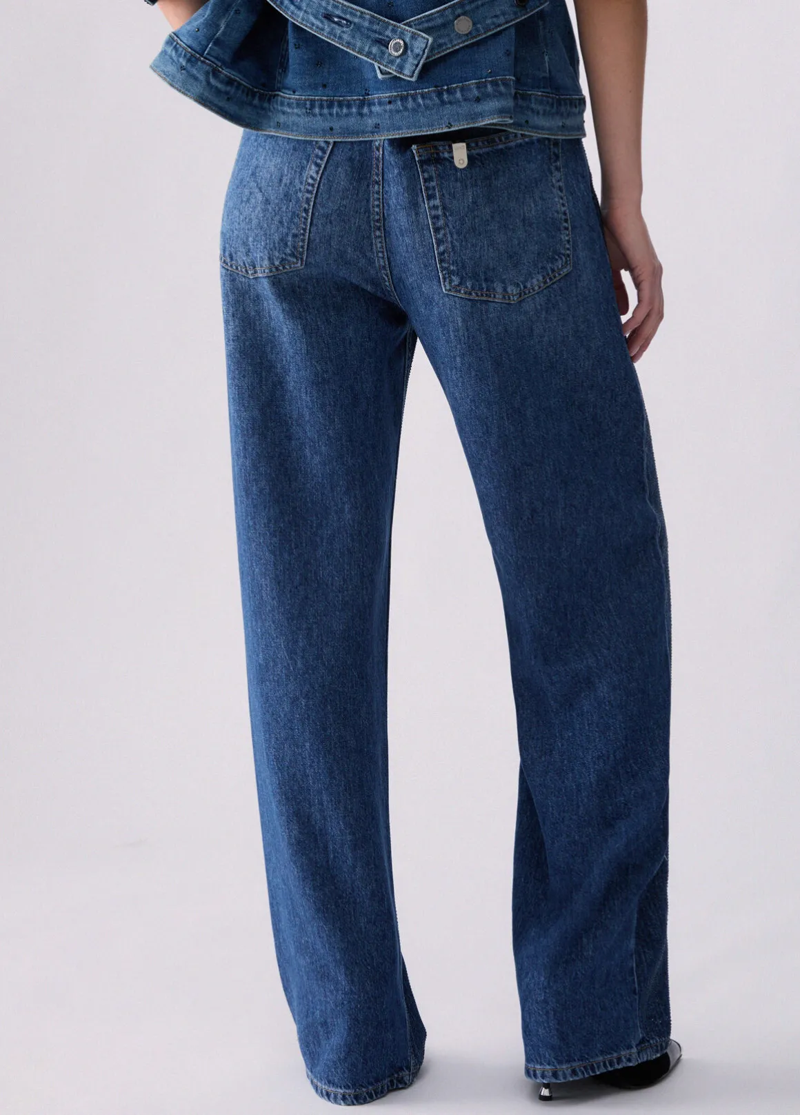 Jeans straight con strass