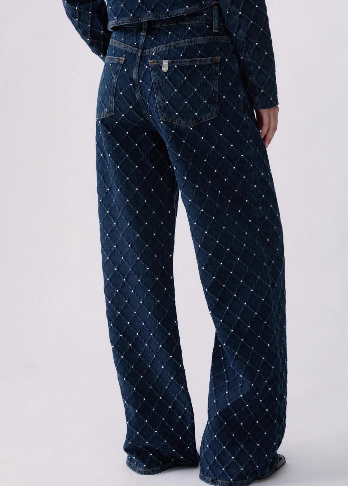Jeans straight matelassé con strass