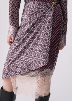 Longuette con dettagli pizzo