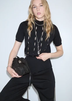 Lupetto con cut-out e perline