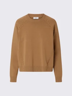 Maglia boxy con dettagli intrecciati