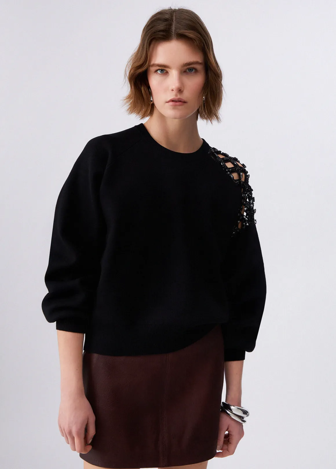 Maglia con ricamo gioiello