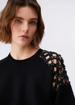 Maglia con ricamo gioiello