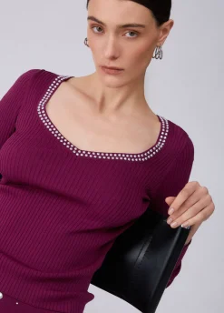 Maglia scollo a V con borchie