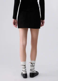 Minigonna in bouclé con zip