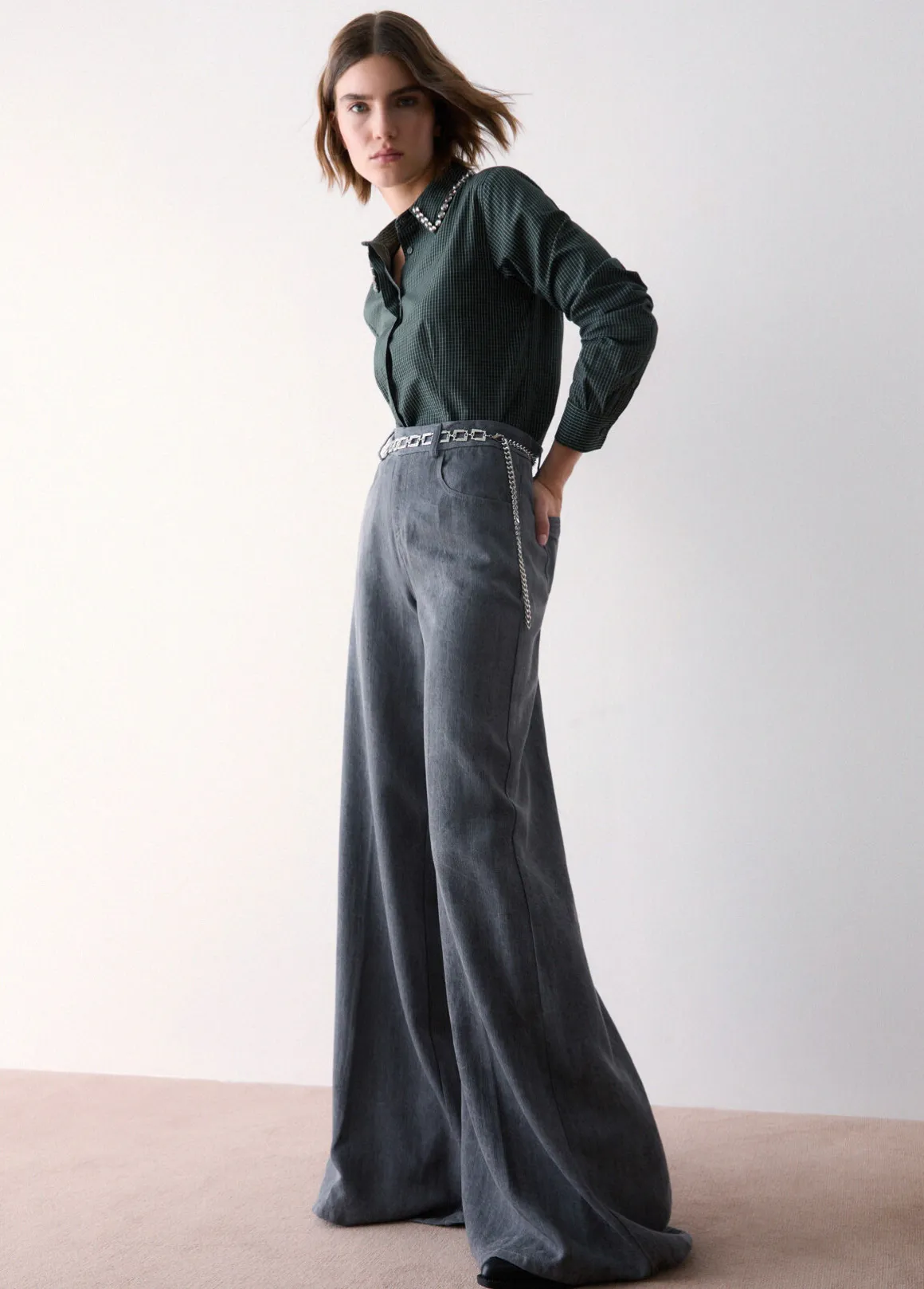 Pantalone flare con cintura