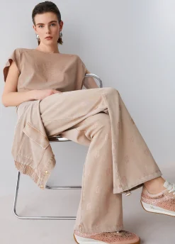 Pantalone in jersey délavé con strass