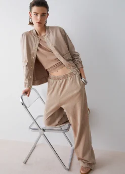 Pantalone in jersey délavé con strass
