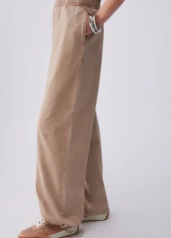 Pantalone in jersey délavé con strass