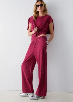 Pantalone in jersey délavé con strass