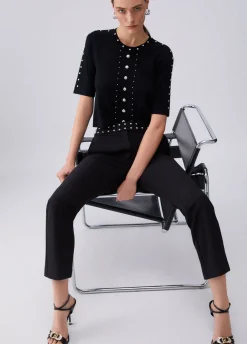 Pantaloni eleganti con borchie