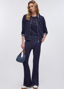 Pantaloni flare in punto milano