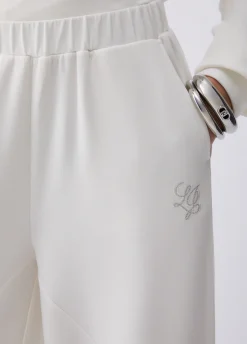 Pantaloni flare in scuba