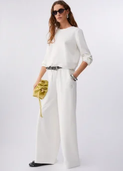 Pantaloni flare in scuba