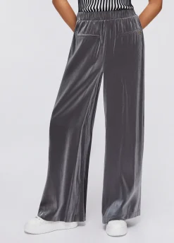 Pantaloni flare laminati