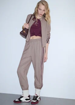 Pantaloni jogging con tape laterale