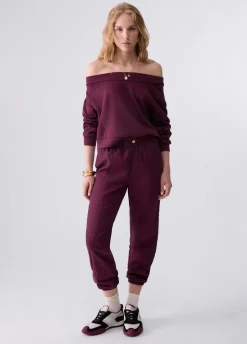 Pantaloni jogging con tape logato